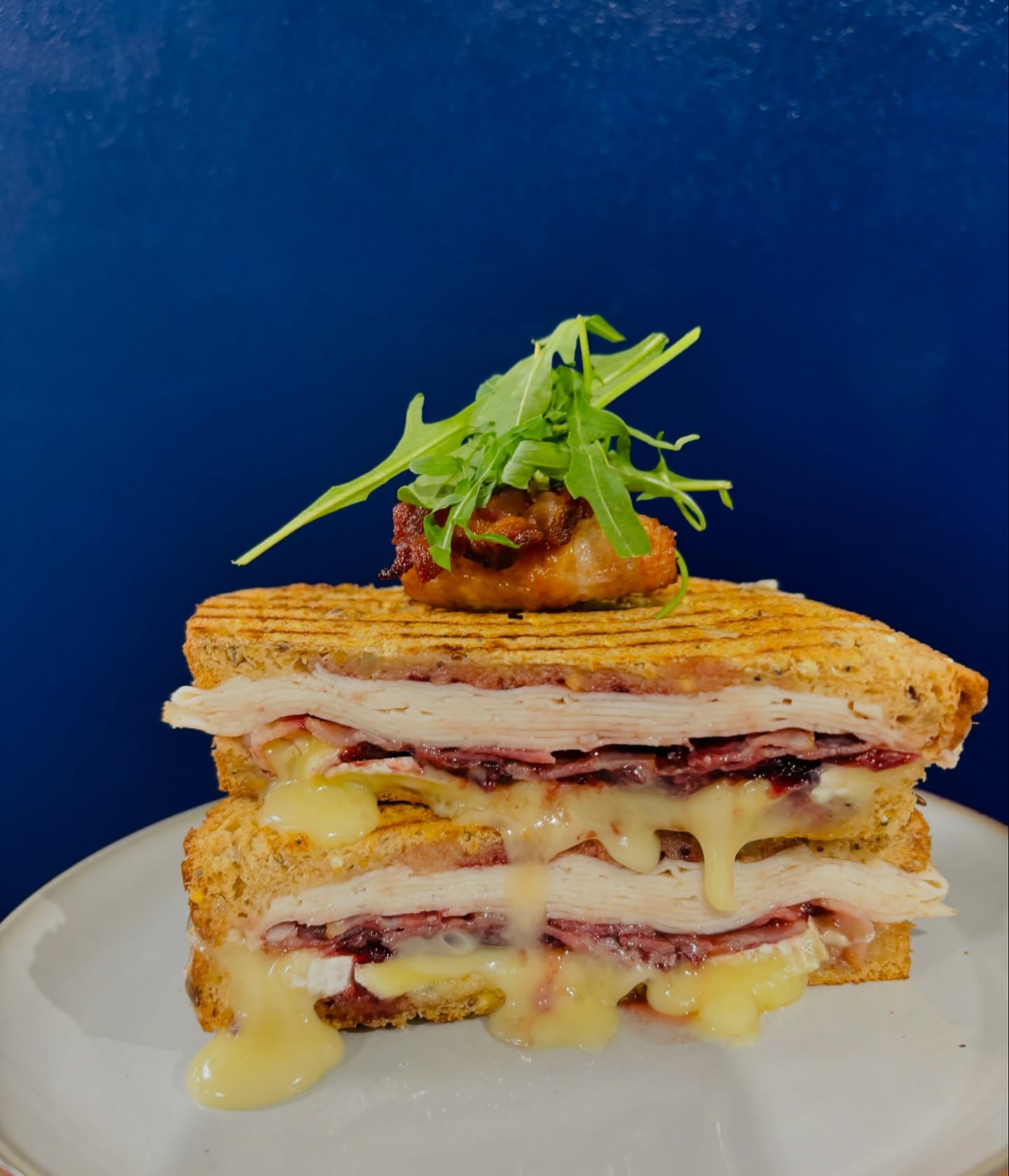 A festive toasted sandwich served at the ATP café